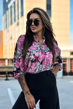 Blusa nera a stampa floraele fucsia bianco con scollo a V e bottoncini