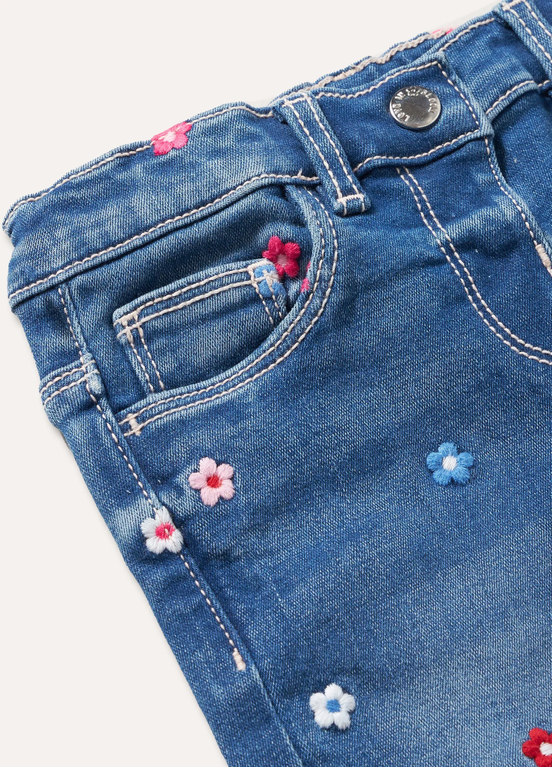 Jeans con ricami neonata